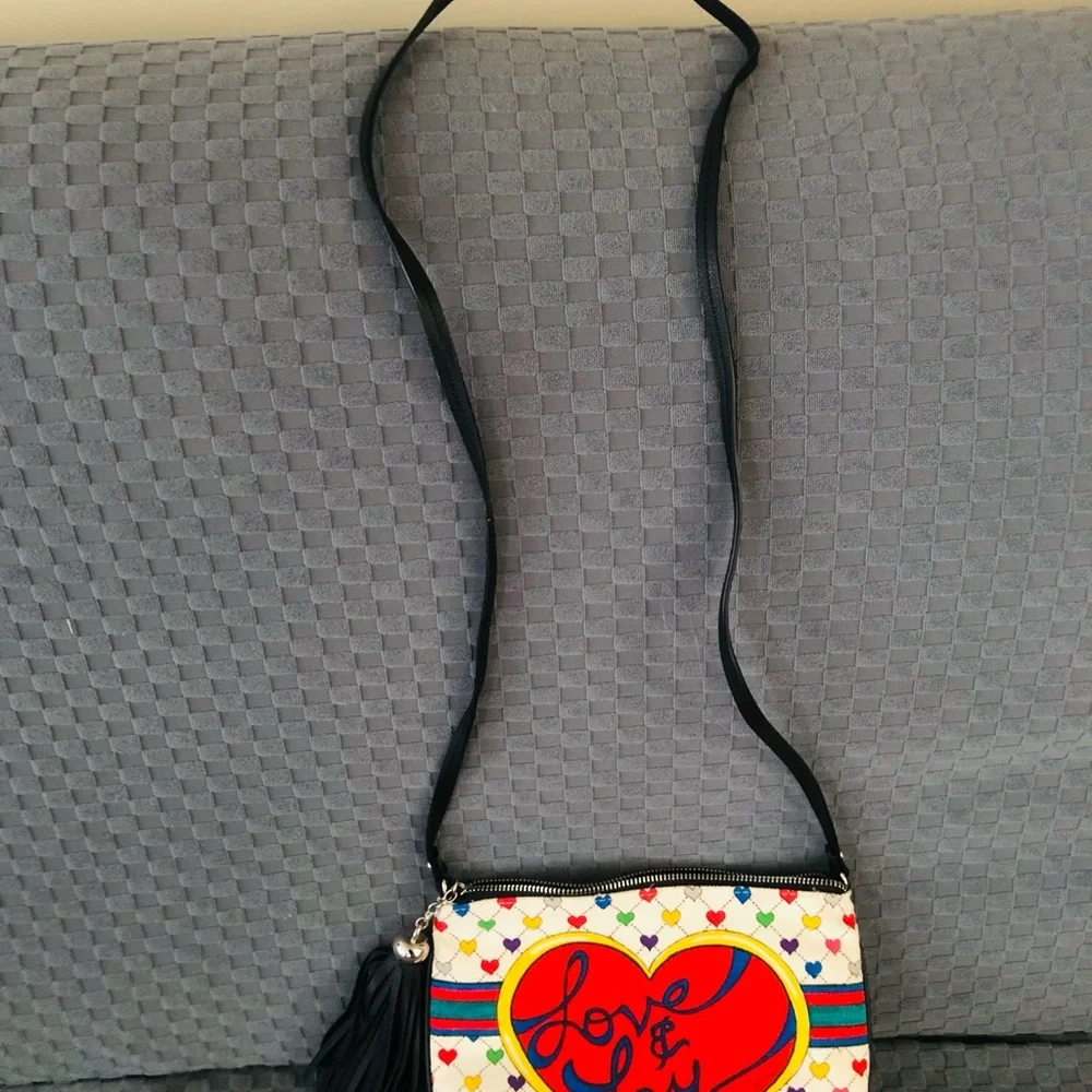 BRIGHTON Collectors*CROSSBODY w/LOVE & JOY BOW design and black tassel NWOT.